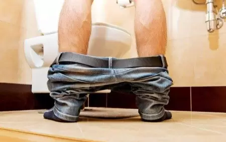 depositphotos_106171598-stock-photo-man-peeing-in-toilet-at