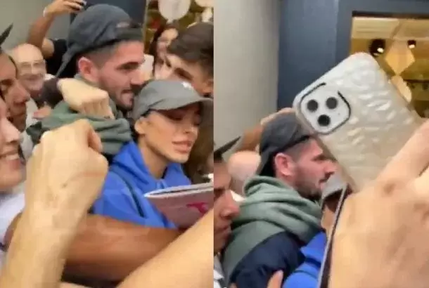 Tini y De Paul fueron sorprendidos por fanticos mientras compraban en un exclusivo local de ropa