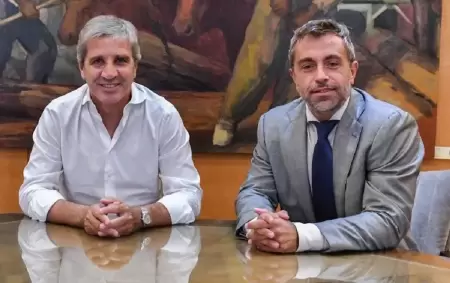 Federico Furiase junto a Luis Caputo.