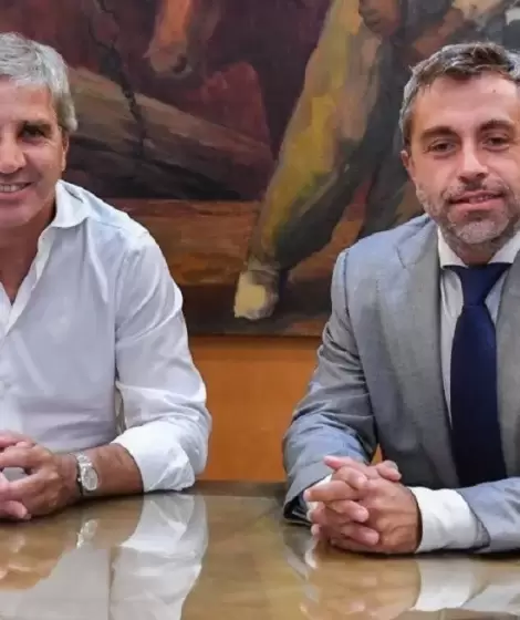 Federico Furiase junto a Luis Caputo.