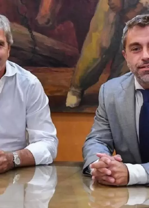 Federico Furiase junto a Luis Caputo.
