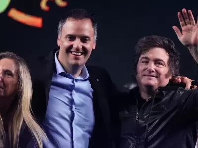 Karina y Javier Milei junto a Manuel Adorni