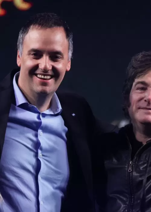 Karina y Javier Milei junto a Manuel Adorni