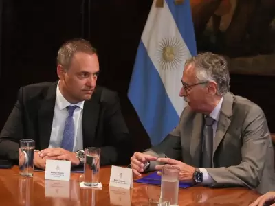 Manuel Adorni y Mario Lugonos