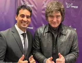 Adri�n Ravier y Javier Milei.