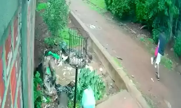 Capturas del video donde se ve al agresor llevarse a la nena de 7 años