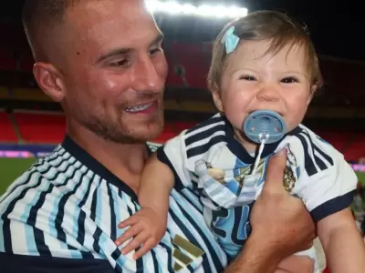 Mac Allister y su hija