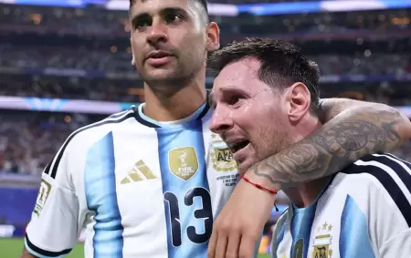El Cuti Romero y Lionel Messi